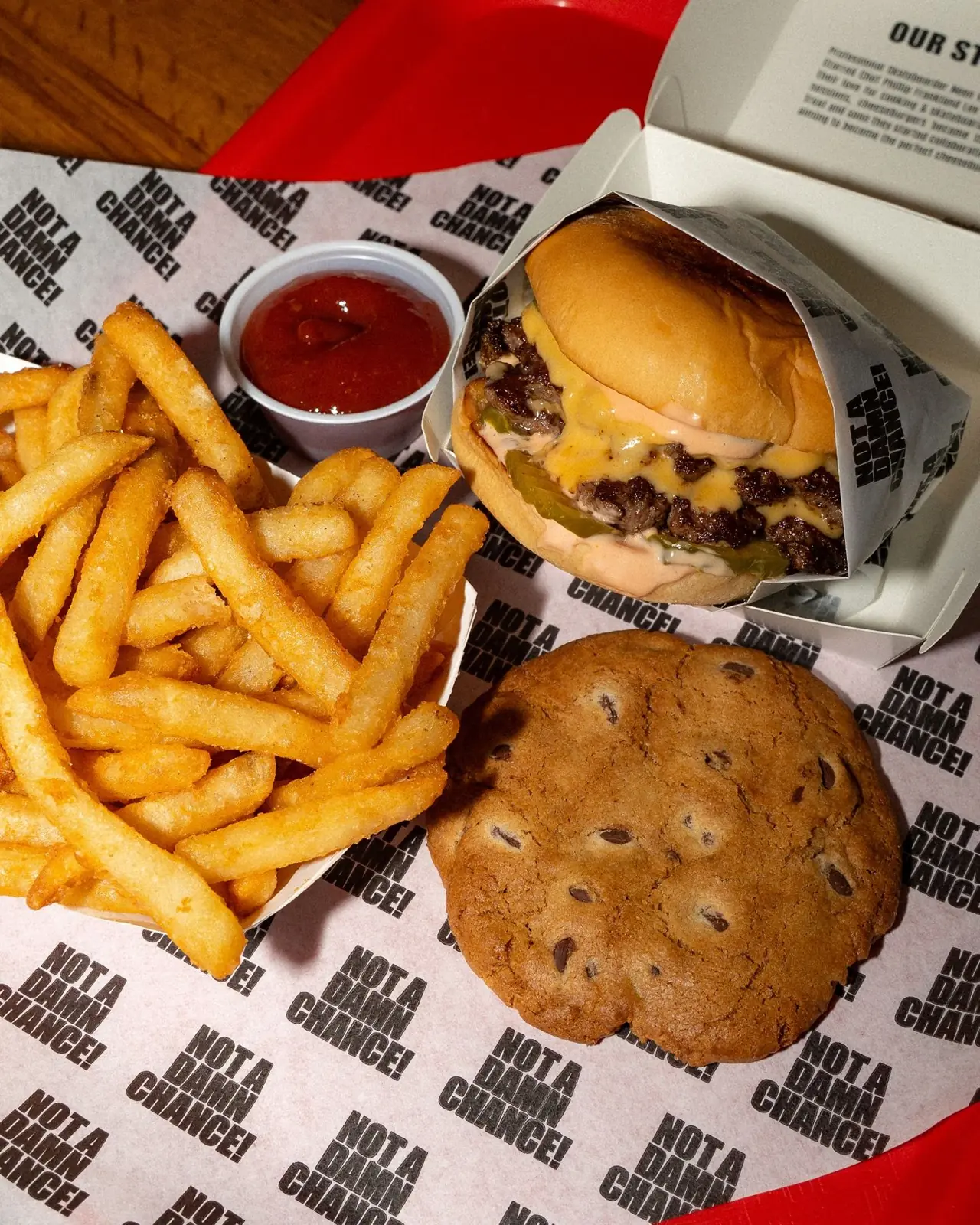 NADC burger with tallow fries and a cookie