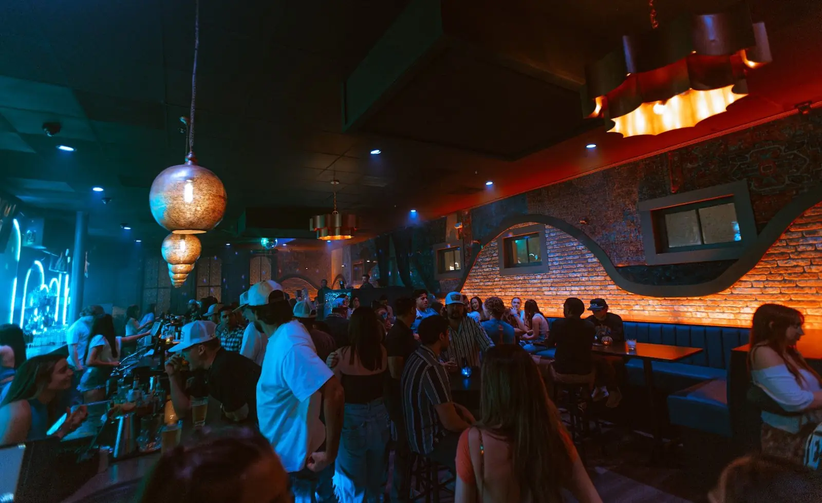 A full room cheering at a private party